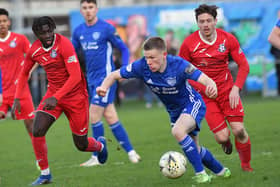 Peterhead's Flynn Duffy attacks the Cvil Service Strollers defence during Saturday's Scottish Cup win. Picture: Duncan Brown)