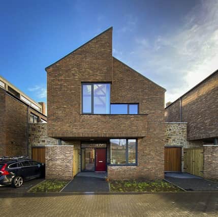 A quiet lane of mews house in Portobello that was designed as a traffic-free haven has been recognised as one of Scotland’s best buildings.