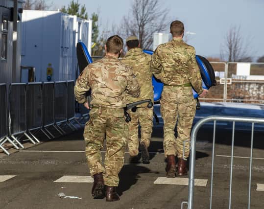 The army help set up a Covid 19 vaccination centre at Queen Margaret University, Edinburgh