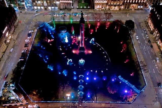 St Andrew Square at night.