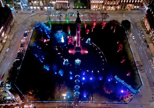 St Andrew Square at night.