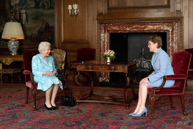 Queen Elizabeth and First Minister Nicola Sturgeon at the Palace of Holyroodhouse (Picture: Jane Barlow/pool/AFP via Getty Images)