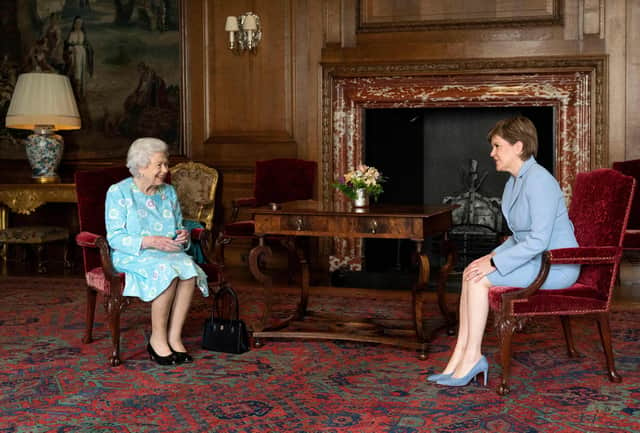 Queen Elizabeth and First Minister Nicola Sturgeon at the Palace of Holyroodhouse (Picture: Jane Barlow/pool/AFP via Getty Images)