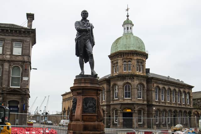 Robert Burns: Reinstated statue unveiled in Leith on Burns Night following tram works forcing its removal. (Picture credit: Lisa Ferguson/JPIMedia)