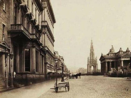 In this old picture of Princes Street, there's no trams, buses or cars - instead you can see horses and carts.