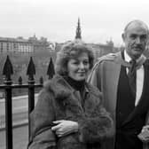 Scottish actor Sean Connery, with his brother Neil Connery and Neil's wife Eleanor Connery, after receiving his honorary degree from Heriot-Watt university in November 1981.