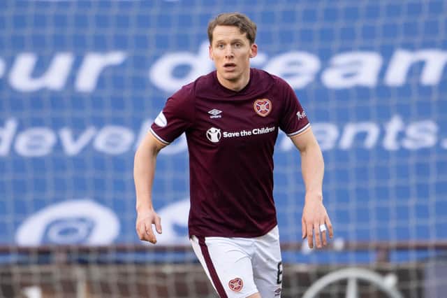 Christophe Berra had to make a hasty exit from Tynecastle on Saturday. Picture: SNS
