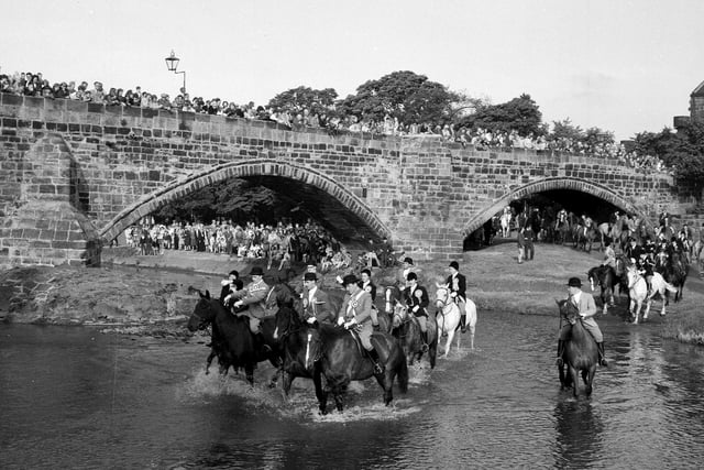 The Musselburgh Crusaders riding club ride over the River Esk on the traditional Crusader's Chase.during the Musselburgh Festival in July 1965.