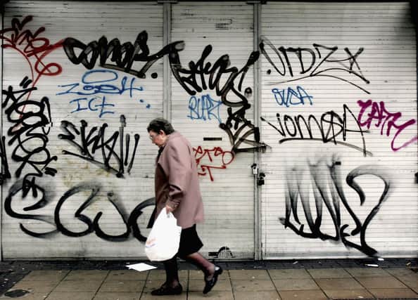 Cleaning up graffiti is one reason why people pay their council tax (Picture: Ian Waldie/Getty Images)