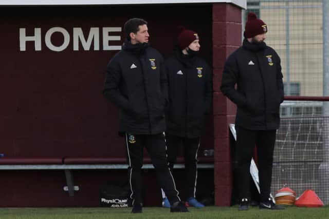 Tranent manager Calum Elliot, left, watched his team maintain their two-point lead at the top