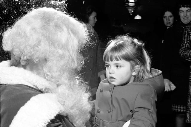 Penelope Watts chats to Santa at Jenners department store in December 1970.