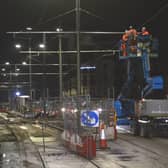Engineers check the tension in the overhead electric wires near the Port of Leith tram stop on Ocean Drive.   Picture: Robert Drysdale.
