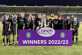 Captain Darren McGregor with the Reserve League trophy after Hibs defeated Queen of the South on Tuesday evening. Picture: Hibernian FC
