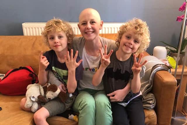 Amy Howard during cancer treatment with her twins Michael and William