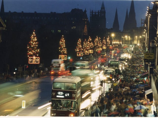 Central Edinburgh was not short of tinsel and fairy lights back in the day as this picture of Princes Streets Christmas decorations illustrates.