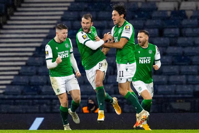 Hibs Christian Doidge celebrates with team-mates after scoring in the most recent meeting with capital rivals Hearts. Photo by Alan Harvey / SNS Group