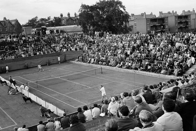 Luis Ayala plays Kurt Nielsen at the Lawn Tennis Championships at Craiglockhart in July 1963.