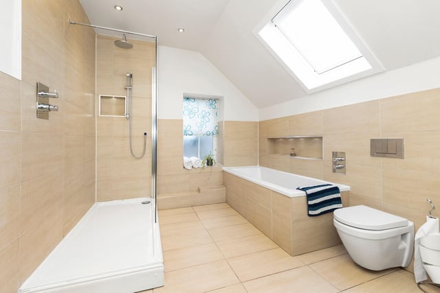 The impressive, light and spacious family bathroom with four piece suite.