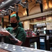 Hospitality businesses were among those hit by tougher restrictions after Christmas. Photo by ANDY BUCHANAN/AFP via Getty Images
