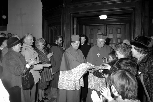 Polish-born Cardinal Josef Glemp is welcomed to St Mary's Cathedral by Cardinal Gordon Gray in February 1985.