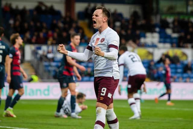 Lawrence Shankland celebrates scoring for Hearts against Ross County.