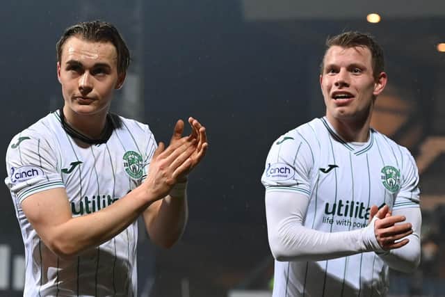 Elias Melkersen, left, and Runar Hauge applaud the Hibs fans after the draw with Dundee