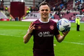 Lawrence Shankland with the match ball after scoring a hat-trick in Hearts' 6-1 win over Ross County. Picture: SNS