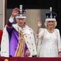 King Charles III and Queen Camilla on the balcony of Buckingham Palace following the coronation on May 6.  Picture: Owen Humphreys/PA Wire