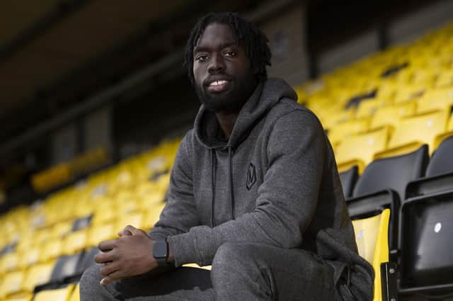 Livingston defender Ayo Obileye is available again after suspension
