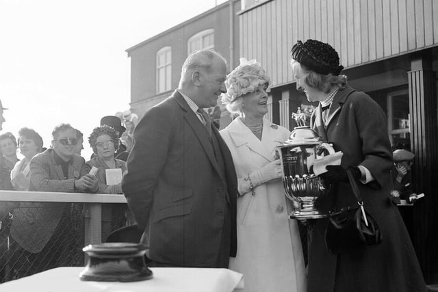 A presentation to Mrs Fenningworth, winner of John Jackson Trophy, at Musselburgh Races in July 1963.