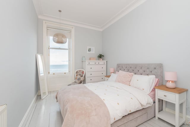 The first of two bedrooms at the property is large and spacious, and has stunning views of the beach and North Sea.