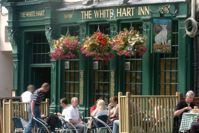 The earliest written records for the supposedly haunted The White Hart Inn on this site date to 1516. The Inn has welcomed the likes of Robert Burns, Burke and Hare and King David I.