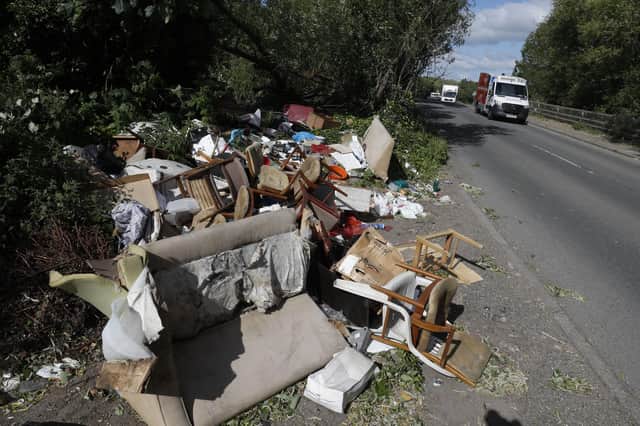 Fly-tipped rubbish is a widespread and costly problem (Picture: Adrian Dennis/AFP via Getty Images)