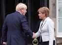 Nicola Sturgeon and Boris Johnson outside Bute House in July 2019   Photo: Jane Barlow/PA Wire