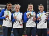 Bronze medalists Zoey Clark, Beth Dobbin, Jill Cherry and Nicole Yeargin of Scotland pose during the medal ceremony for the 4 x 400m relay final. Picture: Tom Dulat/Getty