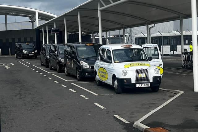 Black cabs at airport rank