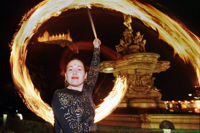 Fire Dancer Marion Kenny  performs at the Edinburgh Christmas Market, held in Princes Street Gardens, in 1997.