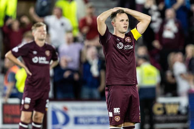 Hearts' Lawrence Shankland reacts to his second goal being chopped off by VAR against PAOK. Pic: SNS
