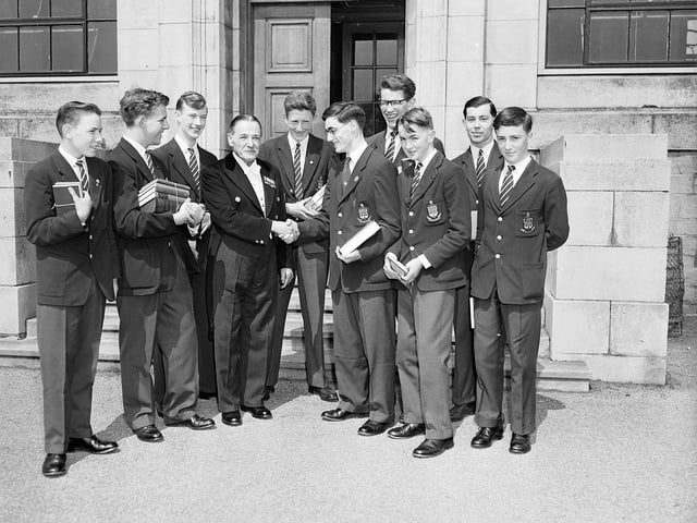 Winning pupils with janitor Mr Vernon after the George Watson's School prize giving in Freemason's Hall in July 1959.