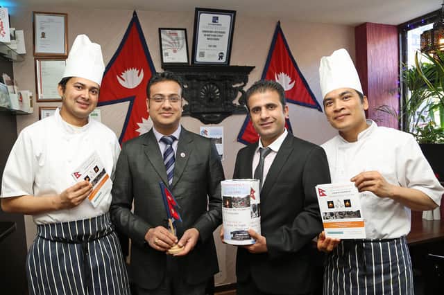 Stock photo of The Gurkha restaurant North High Street, Musselburgh. Navin Kandel pictured second from left.