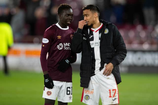 Hearts debutant Garang Kuol with international team-mate and St Mirren midfielder Keanu Baccus after his side's 1-0 win. Picture: SNS