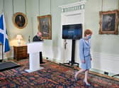 Patrick Harvie and Nicola Sturgeon at Bute House on Friday, cheering the finalisation of a power-sharing agreement. Picture: Jeff J Mitchell/PA Wire.
