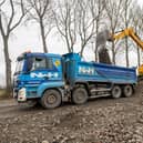 The mountain of recycled building rubble being loaded onto the trucks at the Ferry Road Site