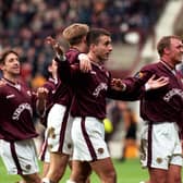 Paul Ritchie is congratulated by Neil McCann (left), Jim Hamilton and Steve Fulton after giving Hearts a 1-0 lead against Ayr United in the 1998 Scottish Cup quarter-final.