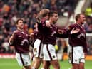 Paul Ritchie is congratulated by Neil McCann (left), Jim Hamilton and Steve Fulton after giving Hearts a 1-0 lead against Ayr United in the 1998 Scottish Cup quarter-final.