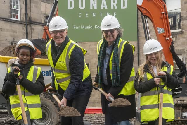 First Minister John Swinney at the Dunard ground breaking with musician Dougie MacLean and schoolchildren