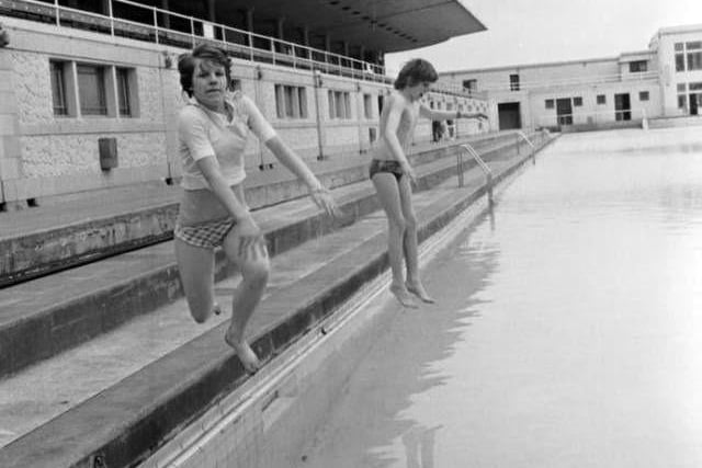 Rhona Heeps and Stewart Somerville were the first children into Portobello open-air pool when it opened for the heatwave in summer 1976.