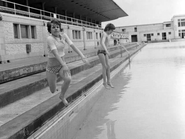 Rhona Heeps and Stewart Somerville were the first children into Portobello open-air pool when it opened for the heatwave in summer 1976.