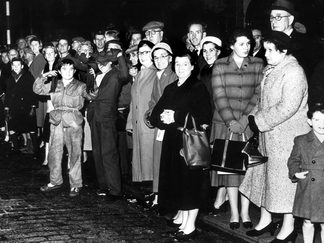 Hearts fans young and old wait for the team bus after they beat Partick Thistle to win the Scottish League Cup in October 1958.