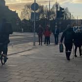 Shambolics singer-songwriters Darren Forbes and Lewis McDonald (in tracksuits) being filmed at Princes Street on Monday for the band's album promo. Photo by Rebeka Thomson.